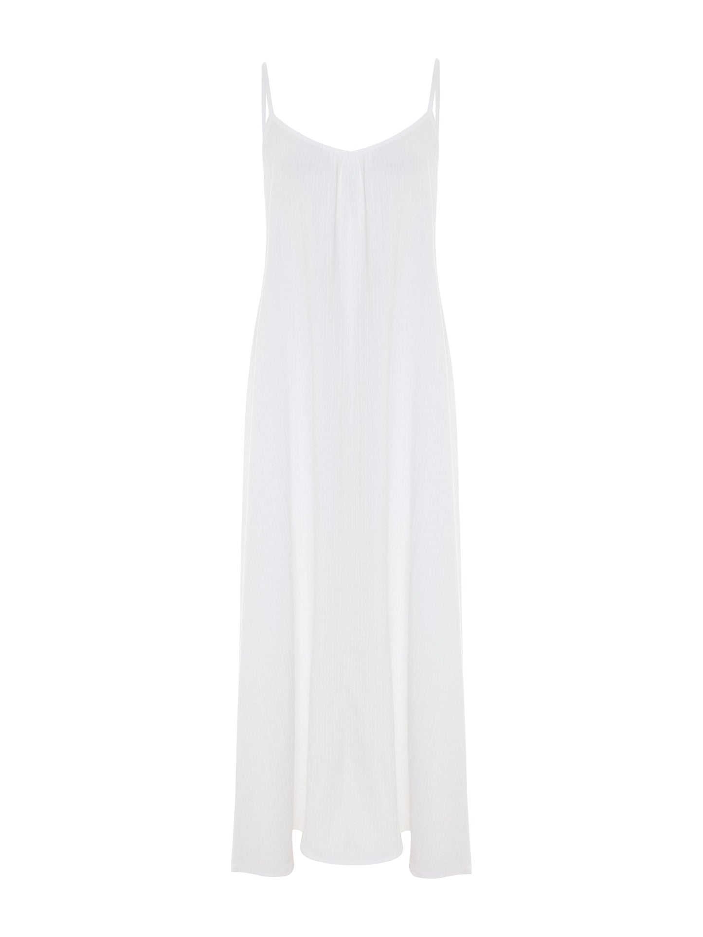 White Backless Maxi Dress by Nextry.pk featuring a flowing silhouette and elegant design.