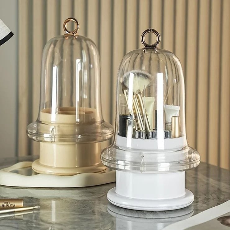 Rotating Nextry.pk cosmetics and makeup brush organizer holding brushes and beauty tools in a clear plastic container.