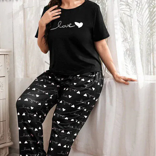 Black heart and love printed night suit made of cotton Jarsy fabric by Comfettie, featuring a comfortable, cozy design.