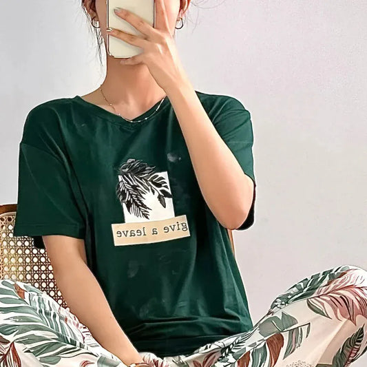 Comfettie green leaf design cotton night dress with a relaxed fit, featuring a comfortable and stylish nightwear option.