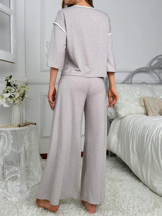 Grey palazzo-style night suit by Comfettie featuring loose-fitting, comfortable fabric perfect for sleepwear.