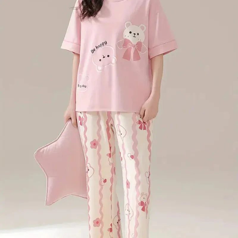 Pink happy bear design night suit for girls and women, made from premium fabric, featuring a cozy, playful pattern by Comfettie.
