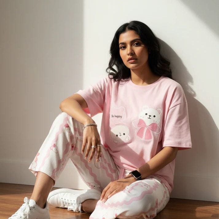 Pink happy bear design night suit for girls and women by Comfettie, featuring soft premium fabric and playful bear graphics.