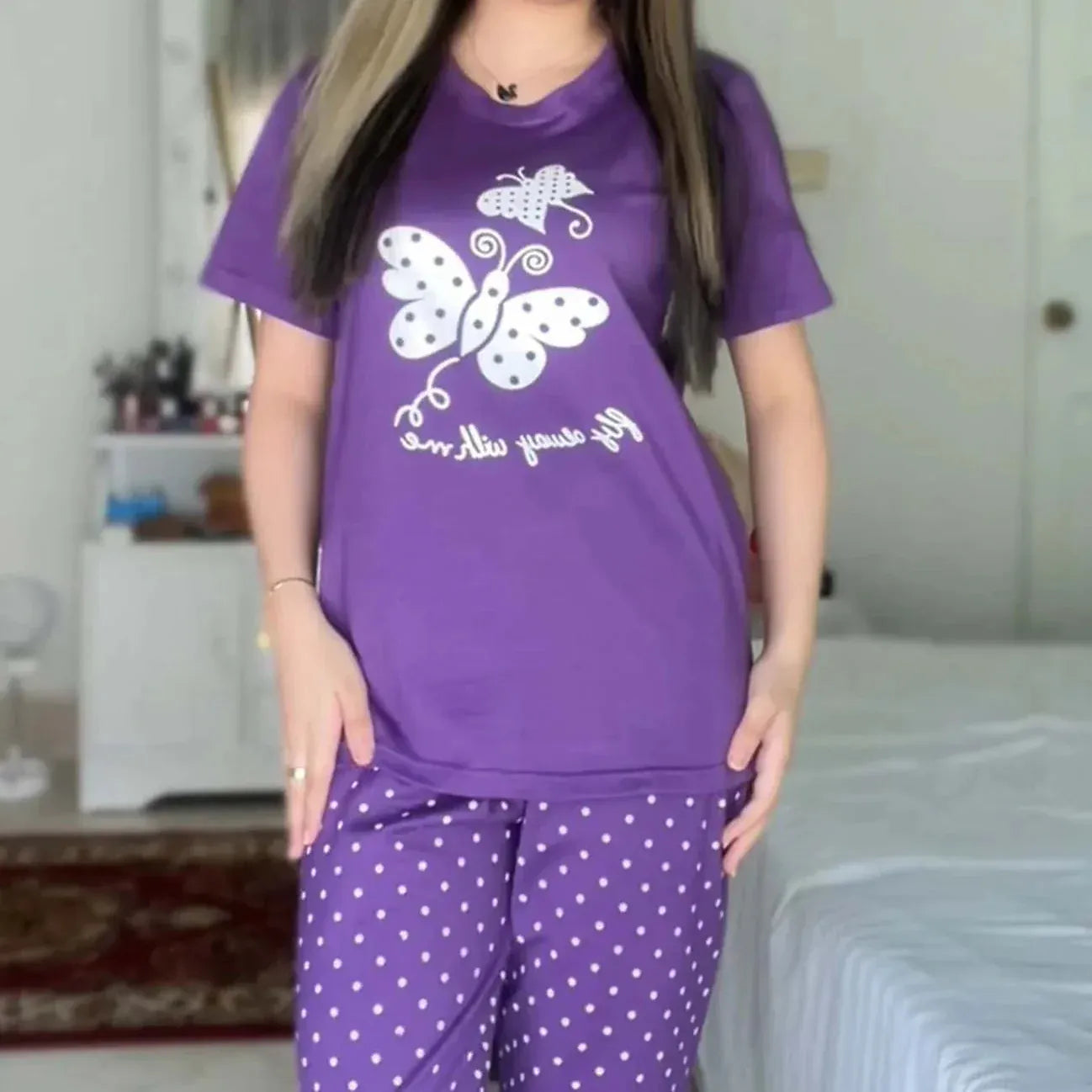 Purple butterfly printed night suit by Comfettie featuring a comfortable, soft fabric and a relaxed fit for cozy sleepwear.