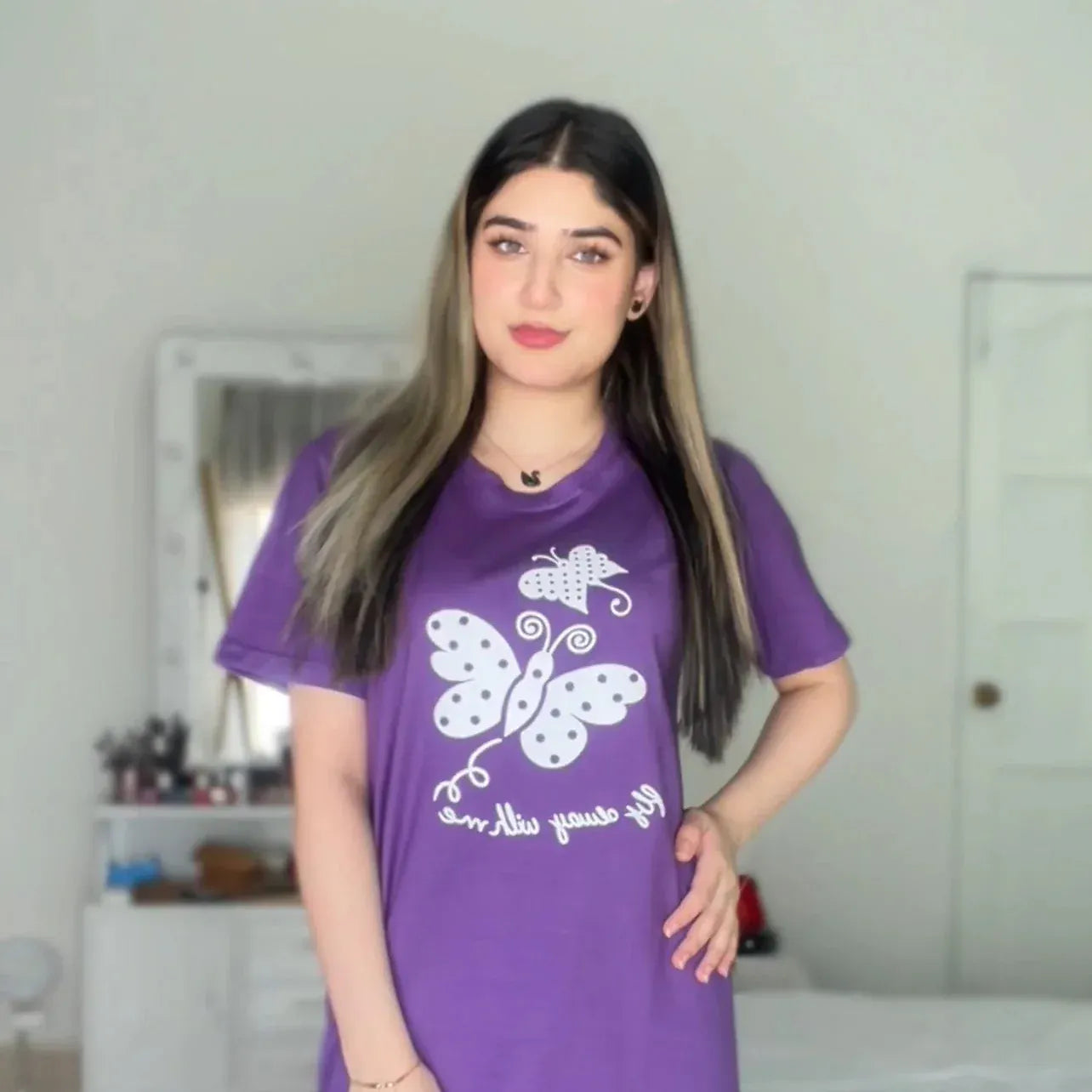 Purple butterfly printed night suit from Comfettie, featuring a soft fabric and comfortable fit for sleep and lounging.