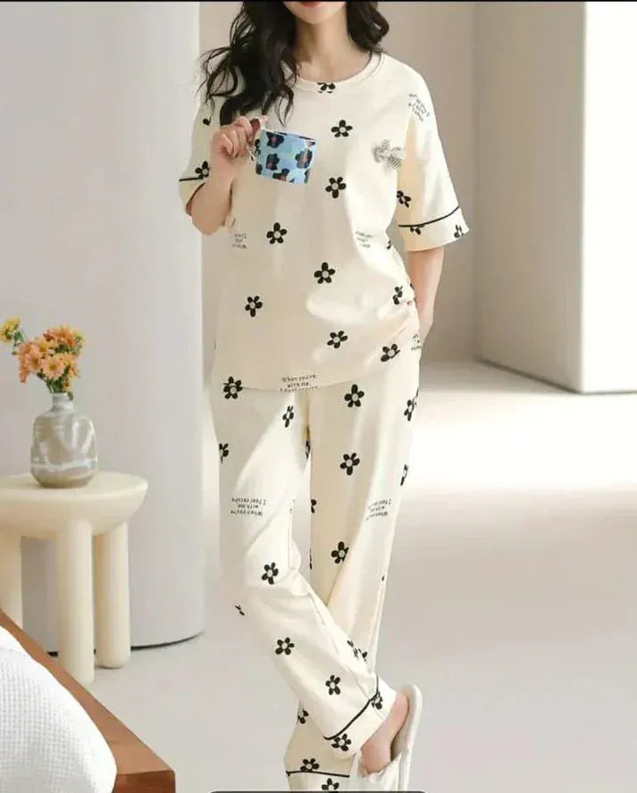 White flower design night suit for girls and women made from premium fabric, featuring a comfortable and stylish look by Comfettie.