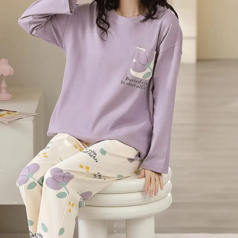 Women's lavender floral pajama set by comfettie, featuring a relaxed fit with matching top and pants, perfect for cozy nights.