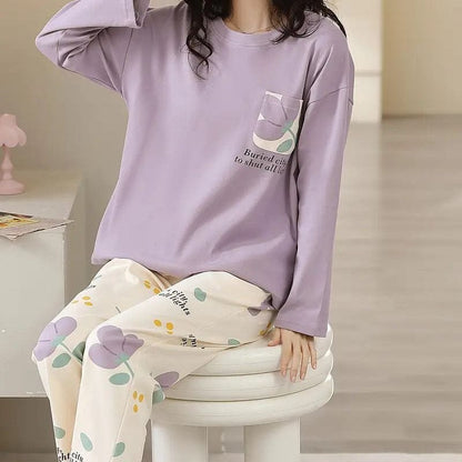 Women's lavender floral pajama set by comfettie, featuring a relaxed fit with matching top and pants, perfect for cozy nights.