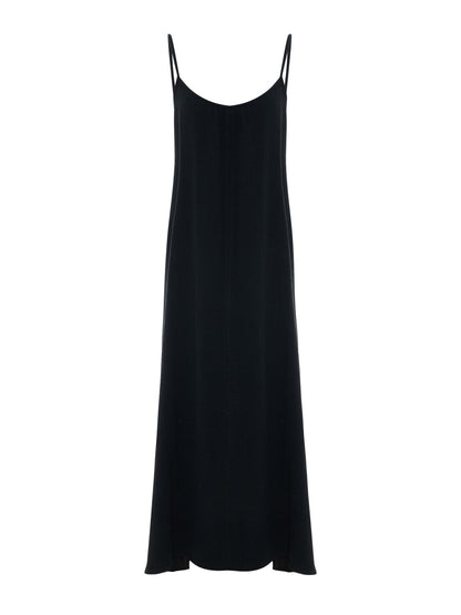 Black Back Less Maxi Dress by Nextry.pk, featuring a stylish open back design and flowing fabric for elegant summer wear.