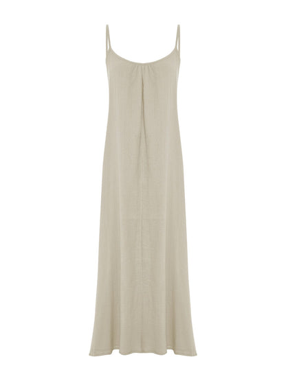 Oatmeal Back Less Maxi Dress by Nextry.pk, flowing fabric, sleeveless design, and elegant backless style perfect for summer wear.