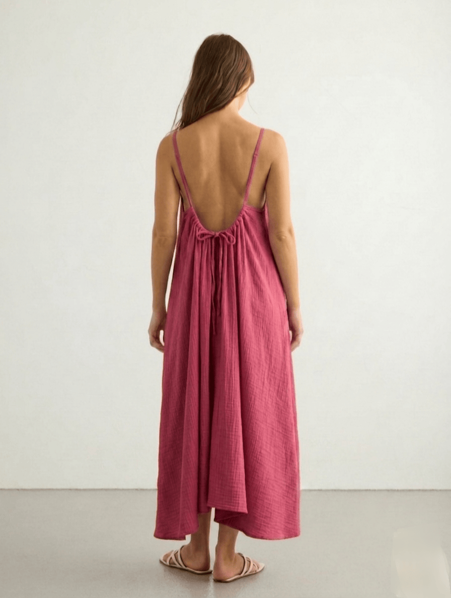 Nextry.pk backless maxi dress featuring a flowing silhouette and elegant design, perfect for formal or summer occasions.