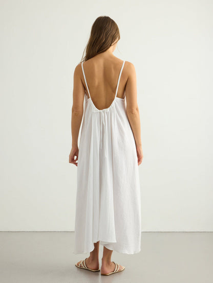 Nextry.pk backless maxi dress in flowing fabric, featuring a stylish design perfect for elegant summer occasions