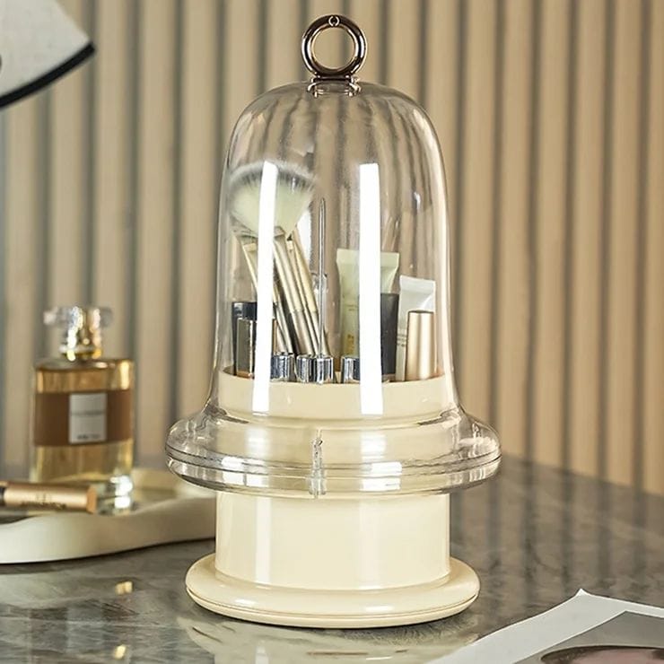 Rotating cosmetics and makeup brush organizer by Nextry.pk, with multiple compartments holding brushes and beauty tools.