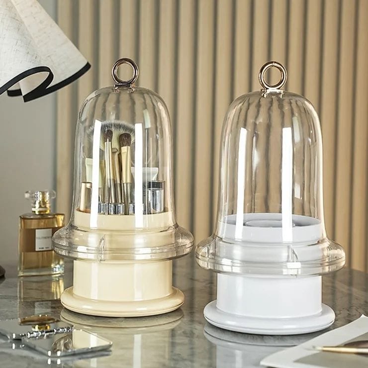 Rotating cosmetics and makeup brush organizer by Nextry.pk, with multiple compartments for easy storage and access.