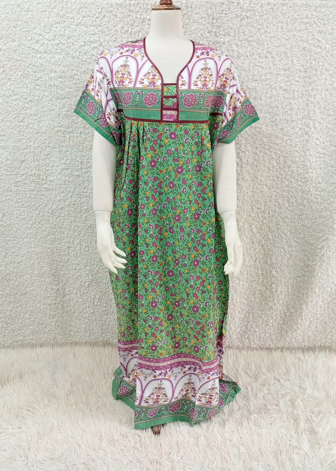Printed Lilan long nighty by Nextry.pk, featuring a comfortable design with colorful floral prints and soft fabric for a cozy night.