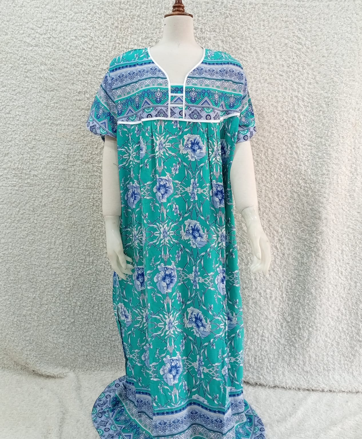 Printed Lilan long nighty from Nextry.pk showing soft fabric and floral print, perfect for comfortable sleeping or lounging.