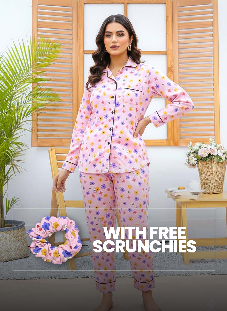 Pink multi-flower linen pajama set with matching scrunchies from Night Need, featuring printed fabric and comfortable fit.