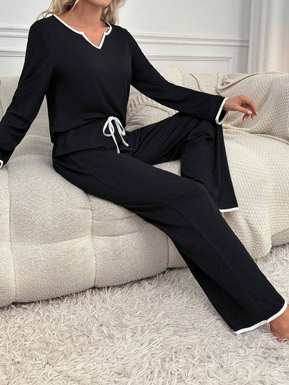 Black palazzo style night suit for women made from cotton jersey, featuring a comfortable and stylish design.
