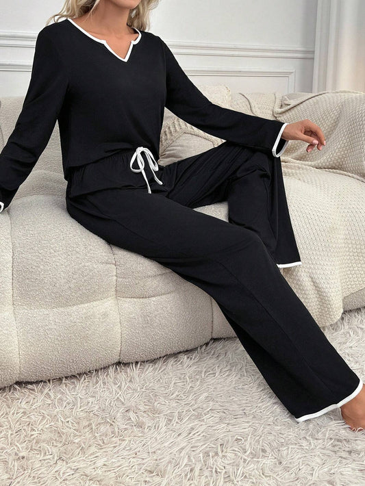 Black palazzo style night suit for women made from cotton jersey, featuring a comfortable and stylish design.
