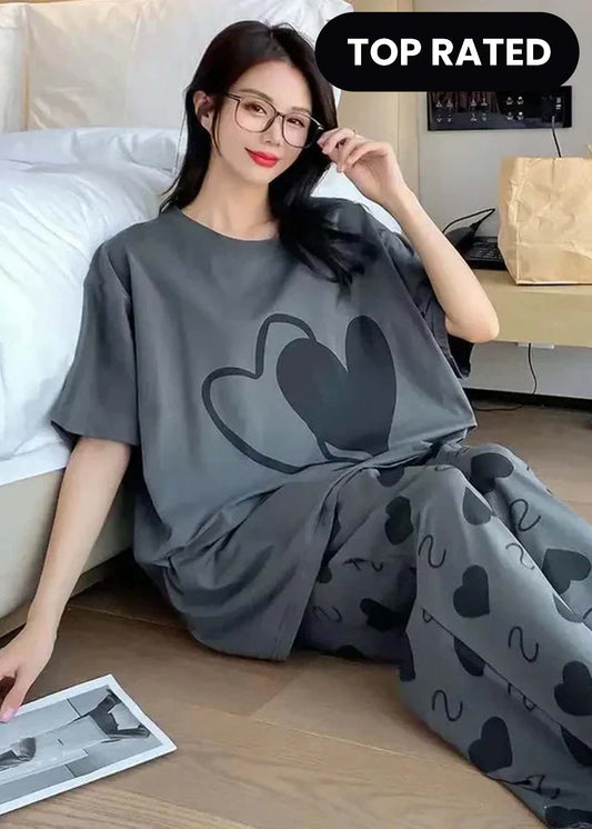 Grey double heart printed women's night suit made of cotton jersey with half sleeves, designed for comfortable sleep.