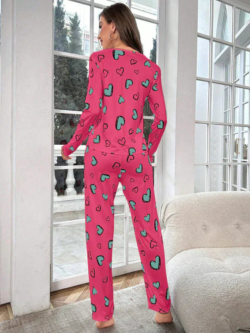 Women’s heart pattern printed night suit made of cotton jersey, featuring a comfortable extended design from The Style Bazar.