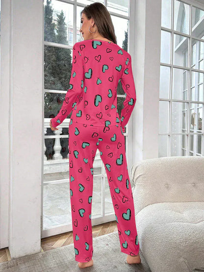 Women’s heart pattern printed night suit made of cotton jersey, featuring a comfortable extended design from The Style Bazar.