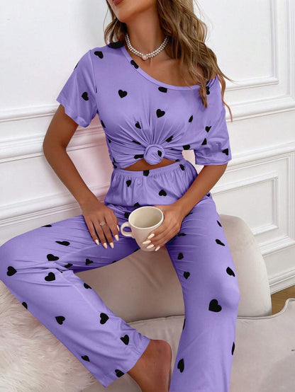 Purple and black multi-heart printed women's cotton jersey night suit with long sleeves and relaxed fit from The Style Bazar.