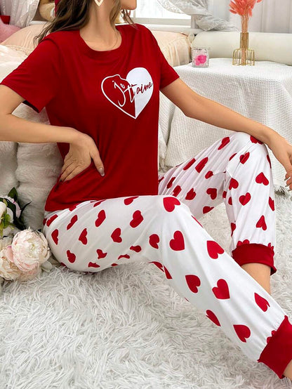 Red heart printed women’s cotton jersey night suit by The Style Bazar, featuring a comfortable, relaxed fit for nighttime wear.