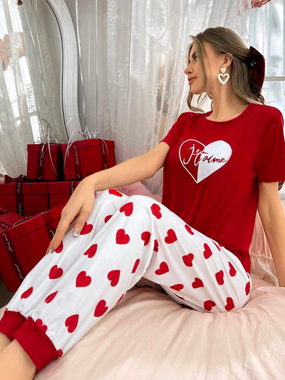 Red heart printed cotton jersey night suit for women, comfortable extended sleepwear from The Style Bazar.