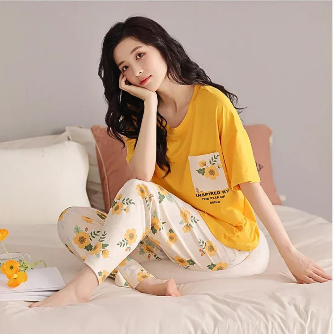 Yellow pocket printed women's cotton jersey night suit with long sleeves and relaxed fit, ideal for comfortable sleepwear.