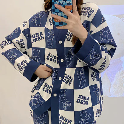 Dora blue check V-neck cotton jersey night suit with button details and printed design, perfect for comfortable sleepwear.