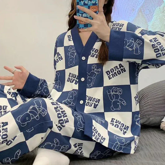 Dora blue check style V-neck button printed night suit made of cotton jersey, featuring a comfortable relaxed fit.
