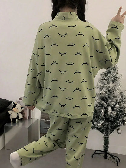 Green emoji V-neck cotton jersey night suit with button details, printed nightwear from The Style Bazar featuring a playful emoji pattern.