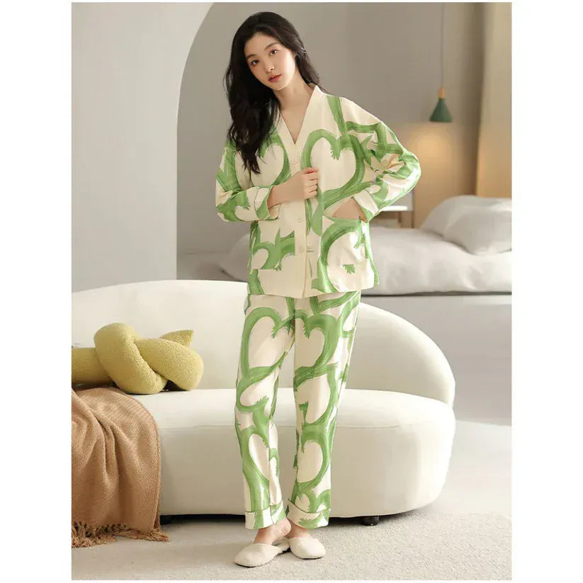 Green hearts printed V-neck cotton jersey night suit with button details from The Style Bazar, comfortable sleepwear for women.