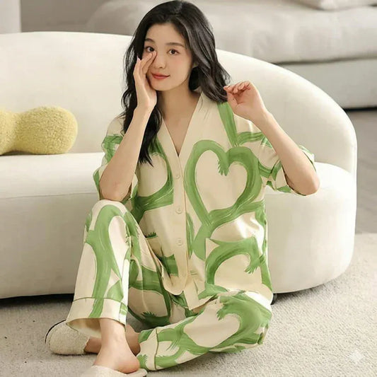 Green hearts printed V-neck cotton jersey night suit with button details from The Style Bazar, perfect for comfortable sleepwear.