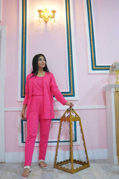 Set of three hot pink plain nightwear pieces for women, featuring comfortable fabric and simple design by The Style Bazar.