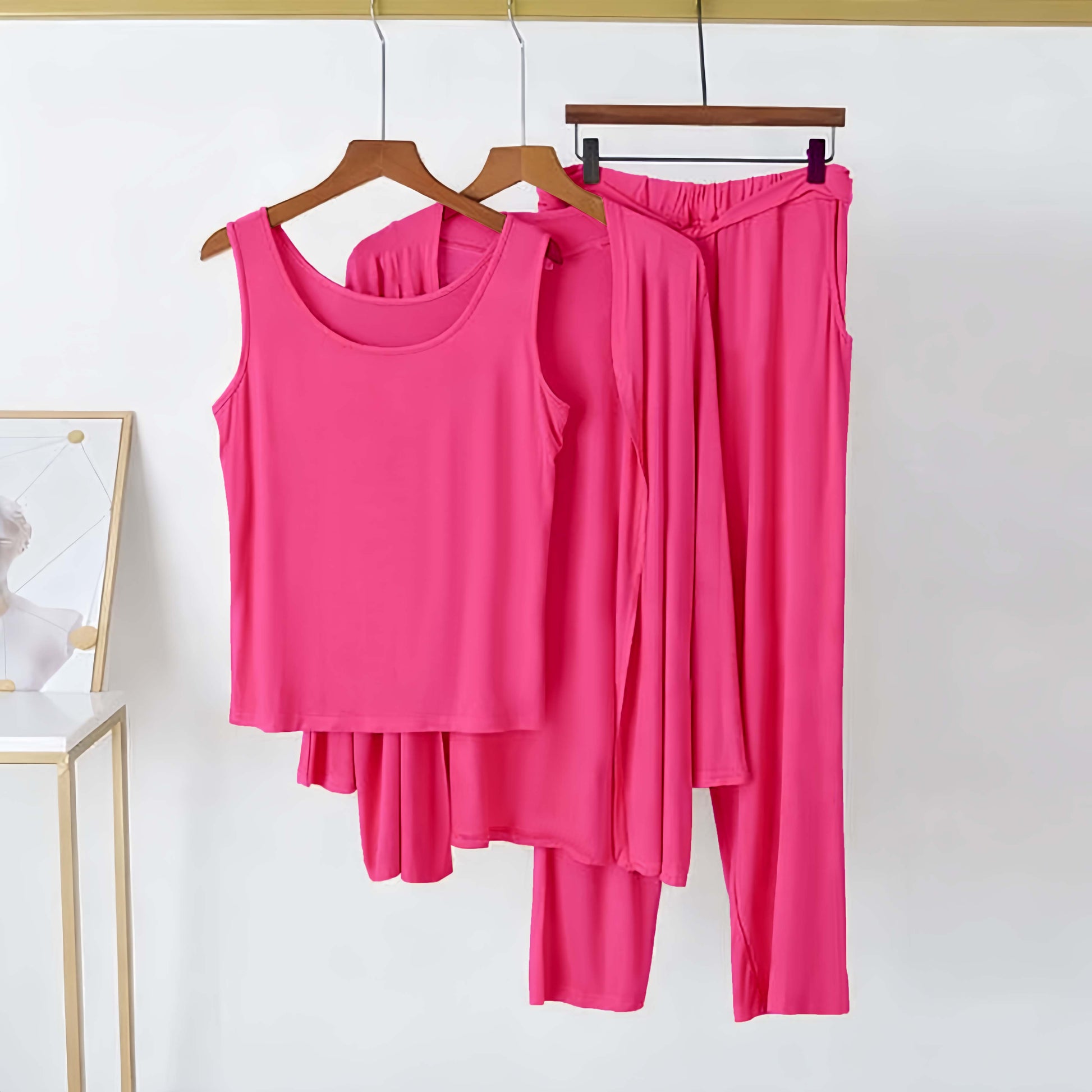 Hot pink women’s 3-piece nightwear set featuring comfortable plain pajamas from The Style Bazar.
