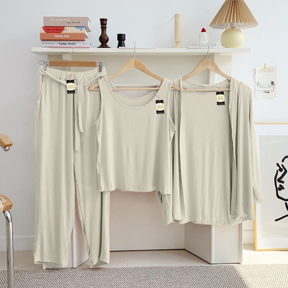 Three Queen ladies night suit with 3-piece inner gown and trousers, shown in soft, comfortable fabric in a cozy indoor setting.