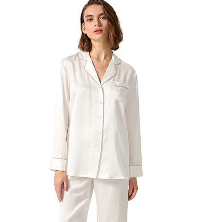 Three Queen viscose silk trouser shirt displayed on a hanger, showcasing lightweight fabric and stylish, comfortable design.